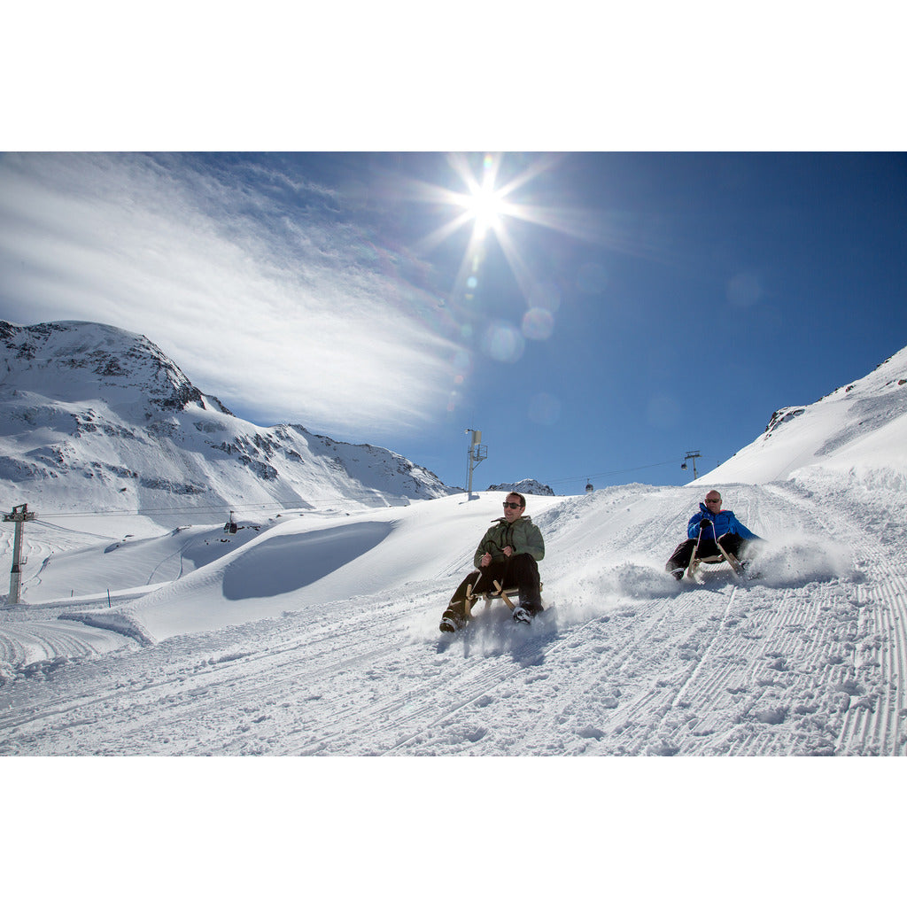 Touring toboggan two-seater with belt seat
