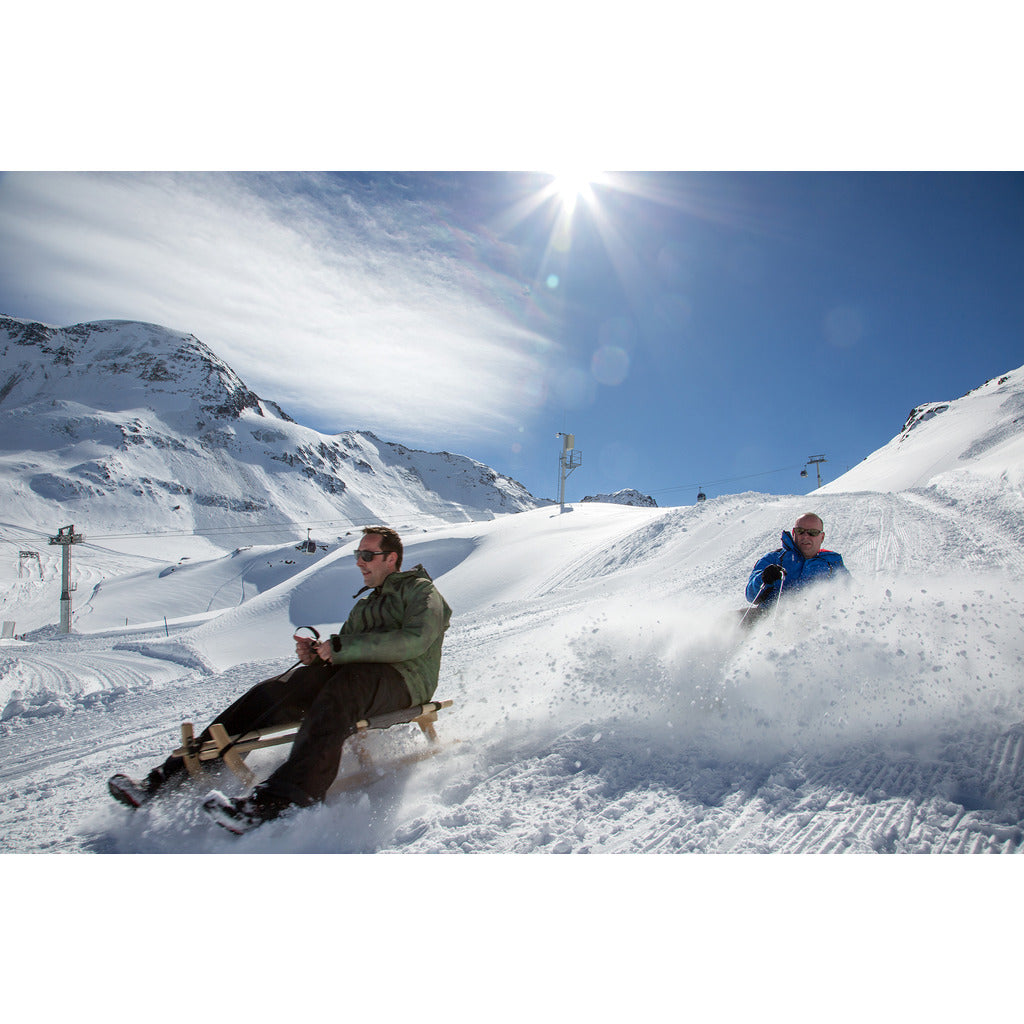 Touring toboggan two-seater with belt seat