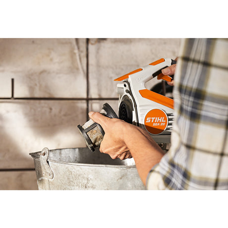 Aspiratore a mano a batteria Stihl SEA 20 + borsa frigo / senza batteria e caricabatteria